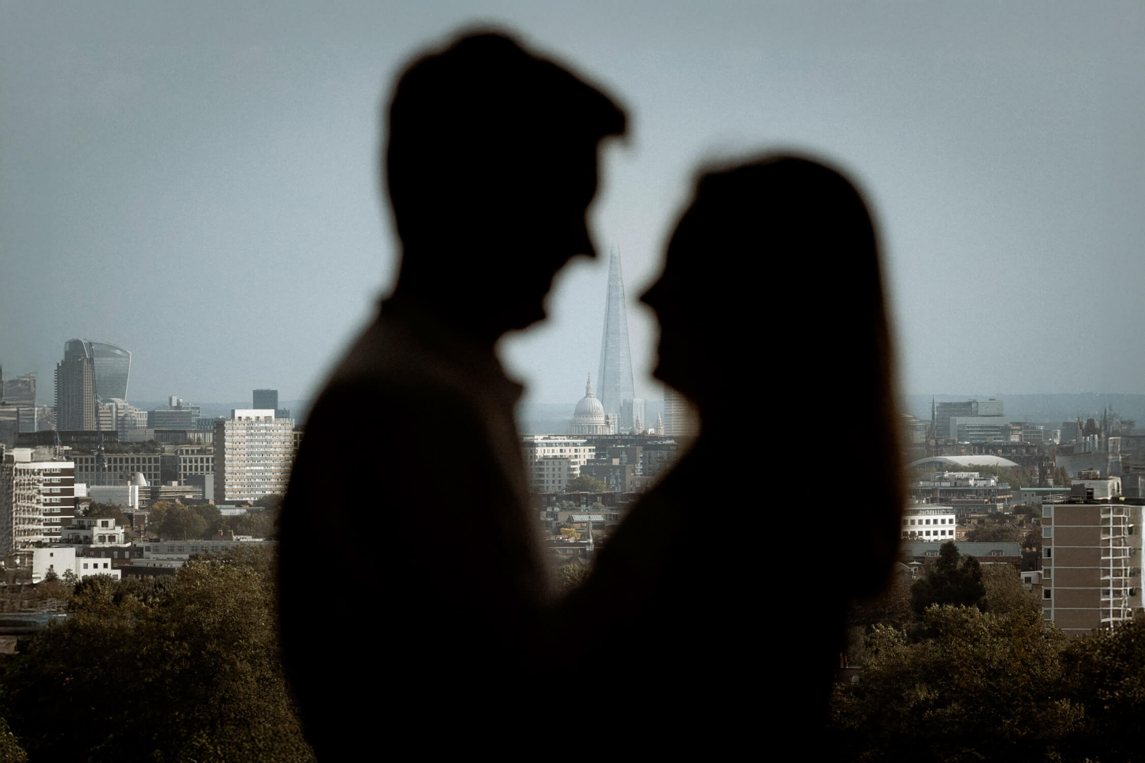 A playful, joy-filled moment at Hampstead Heath, one of the best places to elope in London for relaxed and natural vibes.